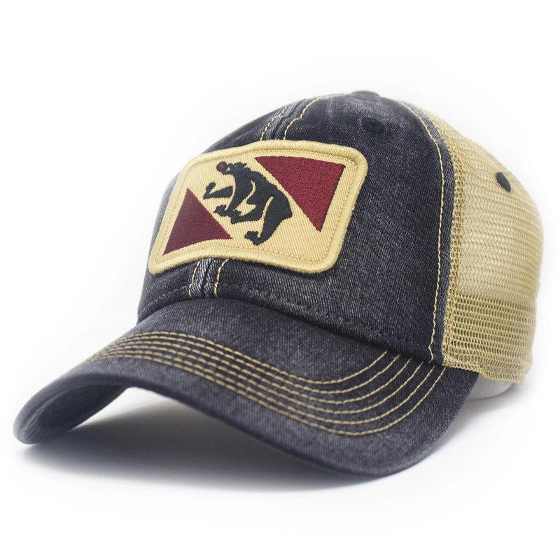 Black trucker hat with khaki mesh backing and tan stitching on the bill. Embroidered with New Bern, north carolina or Bern switzerland city flag. Patch depicts a black bear sticking out its tongue with red triangles in the corners.
