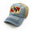 Pale blue trucker hat with khaki mesh backing and navy stitching on the bill. Embroidered with New Bern, north carolina or Bern switzerland city flag. Patch depicts a black bear sticking out its tongue with red triangles in the corners.